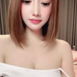A sweet and innocent young lady with bangs and a bob haircut, exuding girlish charm